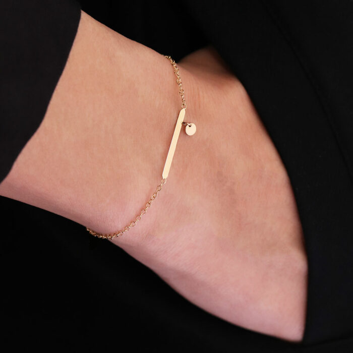 gold bracelet with pendant