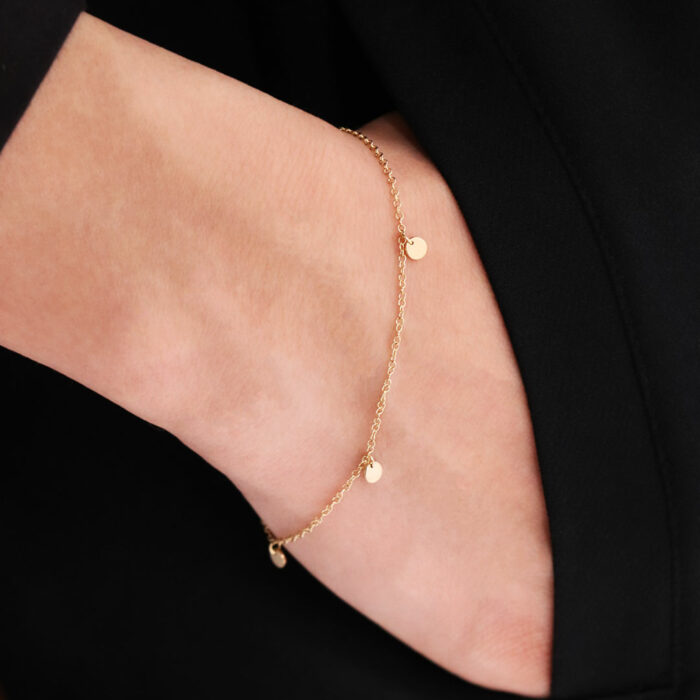 gold bracelet with pendants